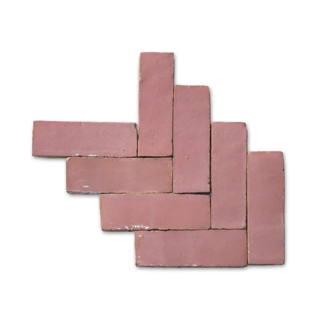 Agadir flammed pink Bejmat tiles in herringbone pattern – handmade Moroccan Zellige tiles