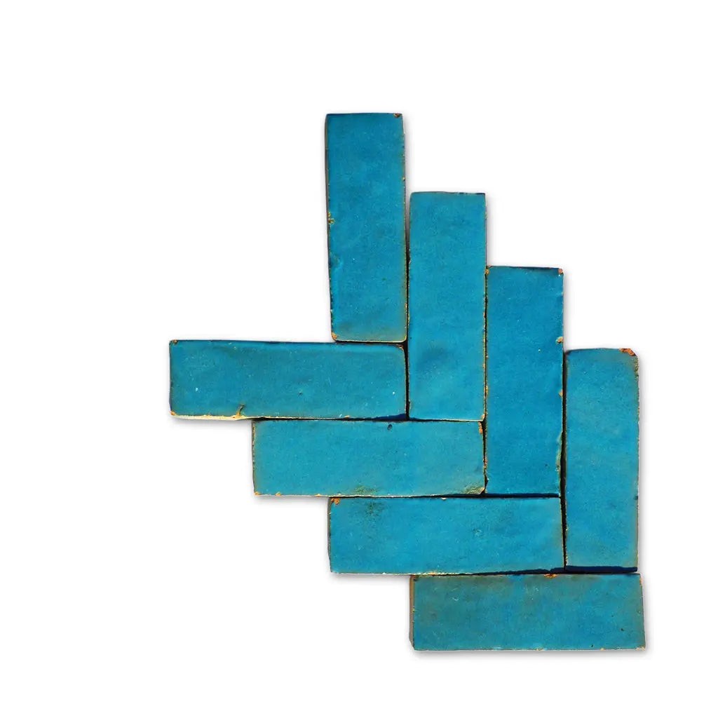 Atlas petrol blue glossy Bejmat tiles in herringbone layout – handmade Moroccan Zellige tiles