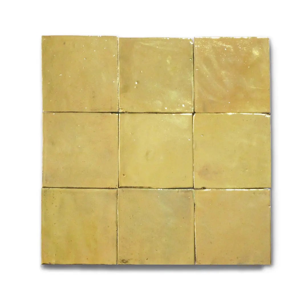 Handmade Moroccan Zellige tile in glossy gold finish, 10x10 cm, by Zelligerar.