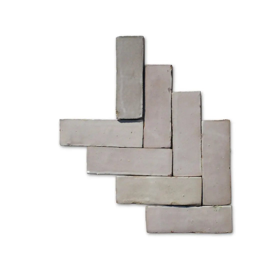 Tan Tan ecru handmade Bejmat tiles in herringbone layout – Moroccan Zellige tiles