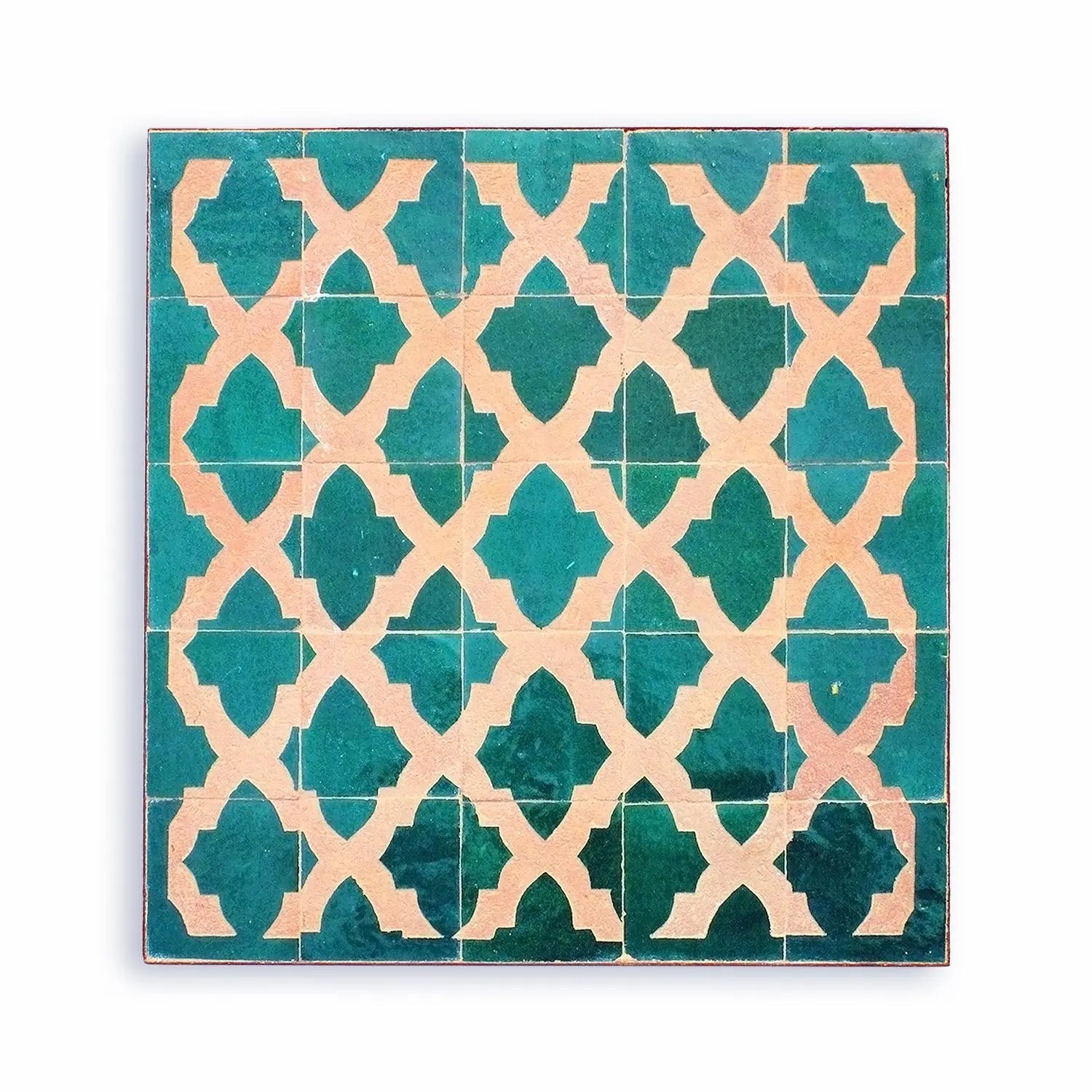 Close-up of Atlas Green Trellis Chiseled Zellige Tile showing the handcrafted emerald green and natural clay pattern.