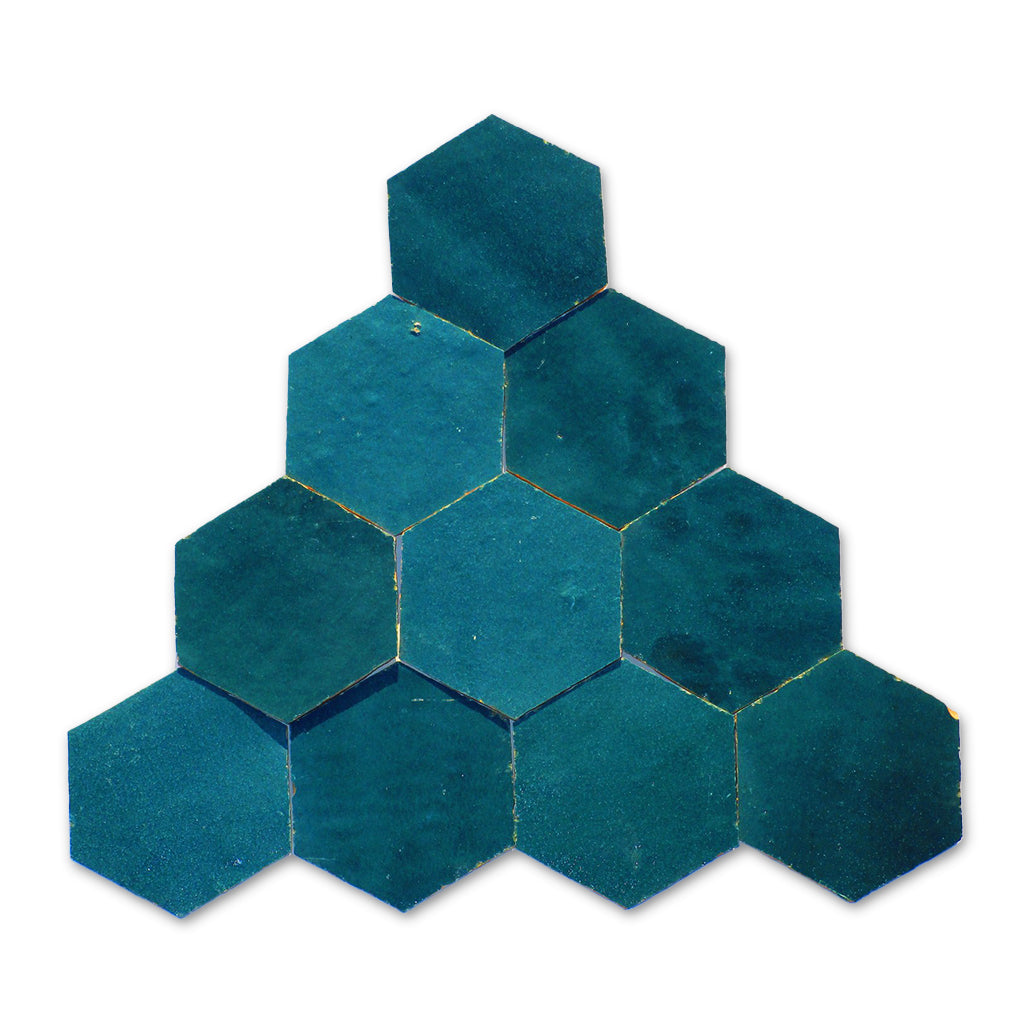 Hexagonal teal tiles arranged in a pattern on a white background