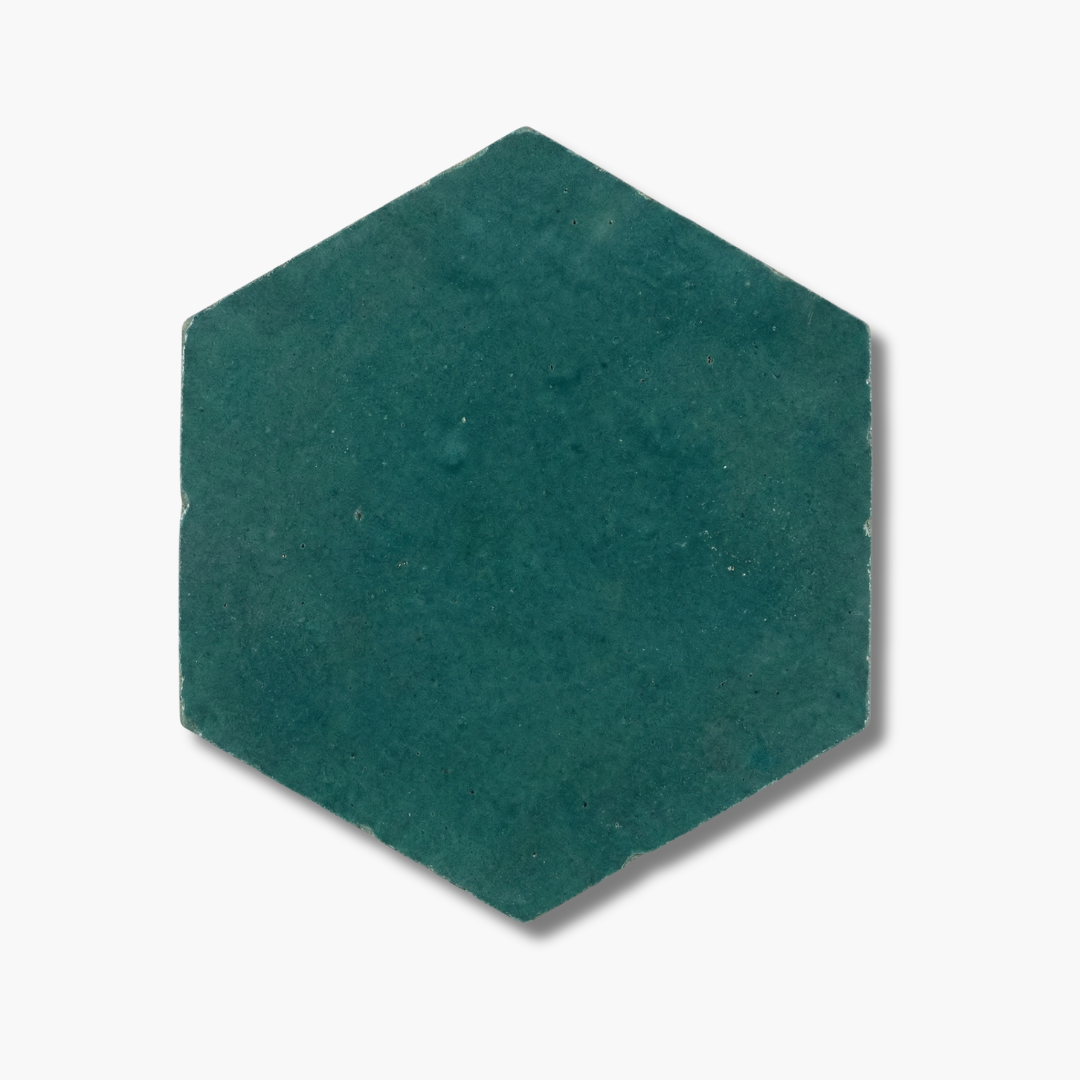 Hexagonal green tile on a white background