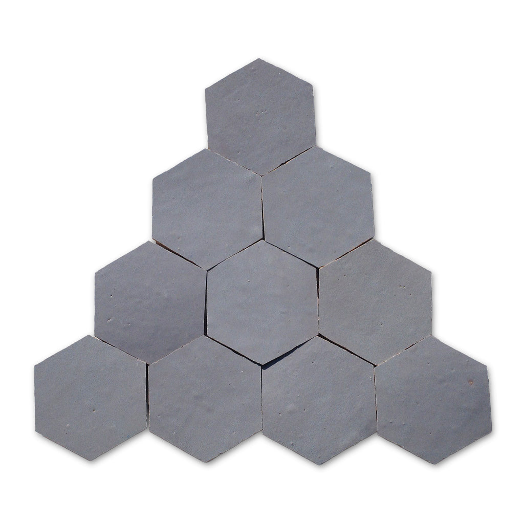 Hexagonal tiles arranged in a pyramid formation on a white background