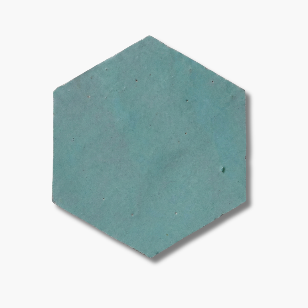 Hexagonal teal tile on a white background