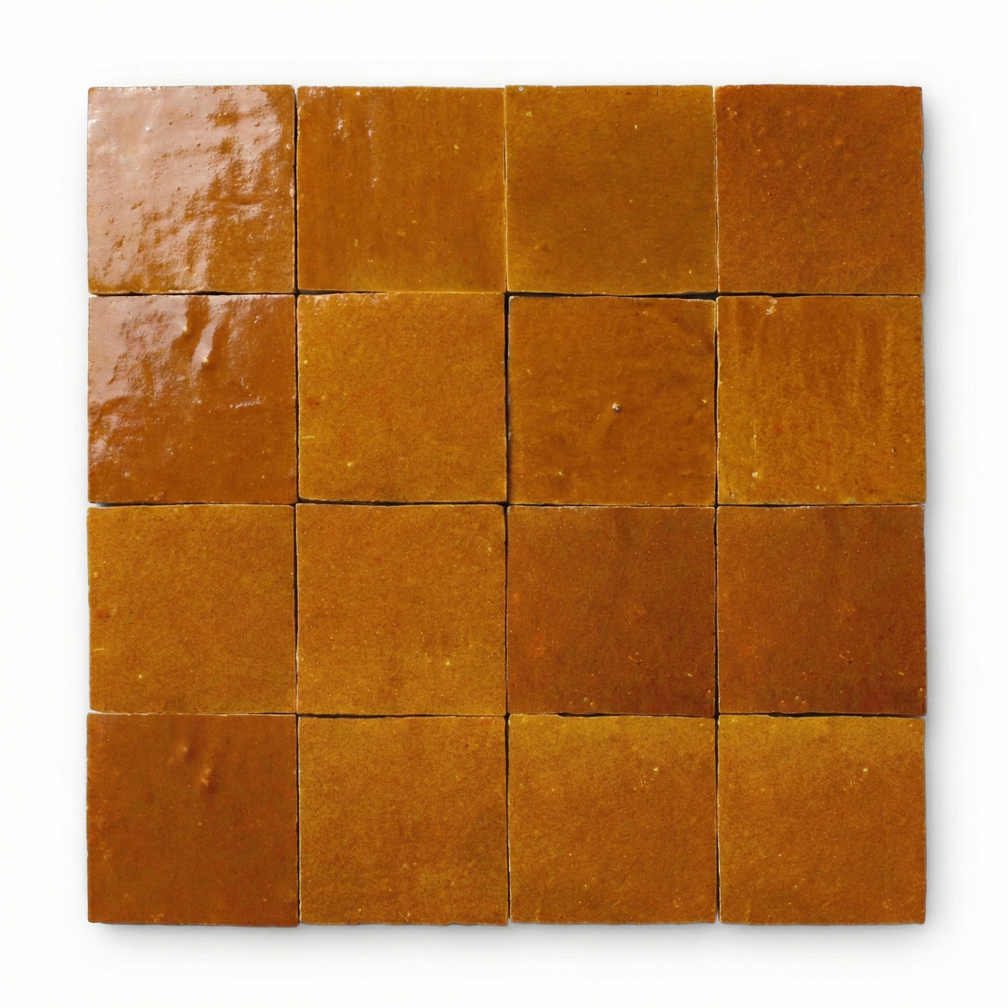 Taza Tagine Zellige tiles, 10x10cm handcrafted Moroccan burnt-orange terracotta wall tiles with a glossy, reflective finish.