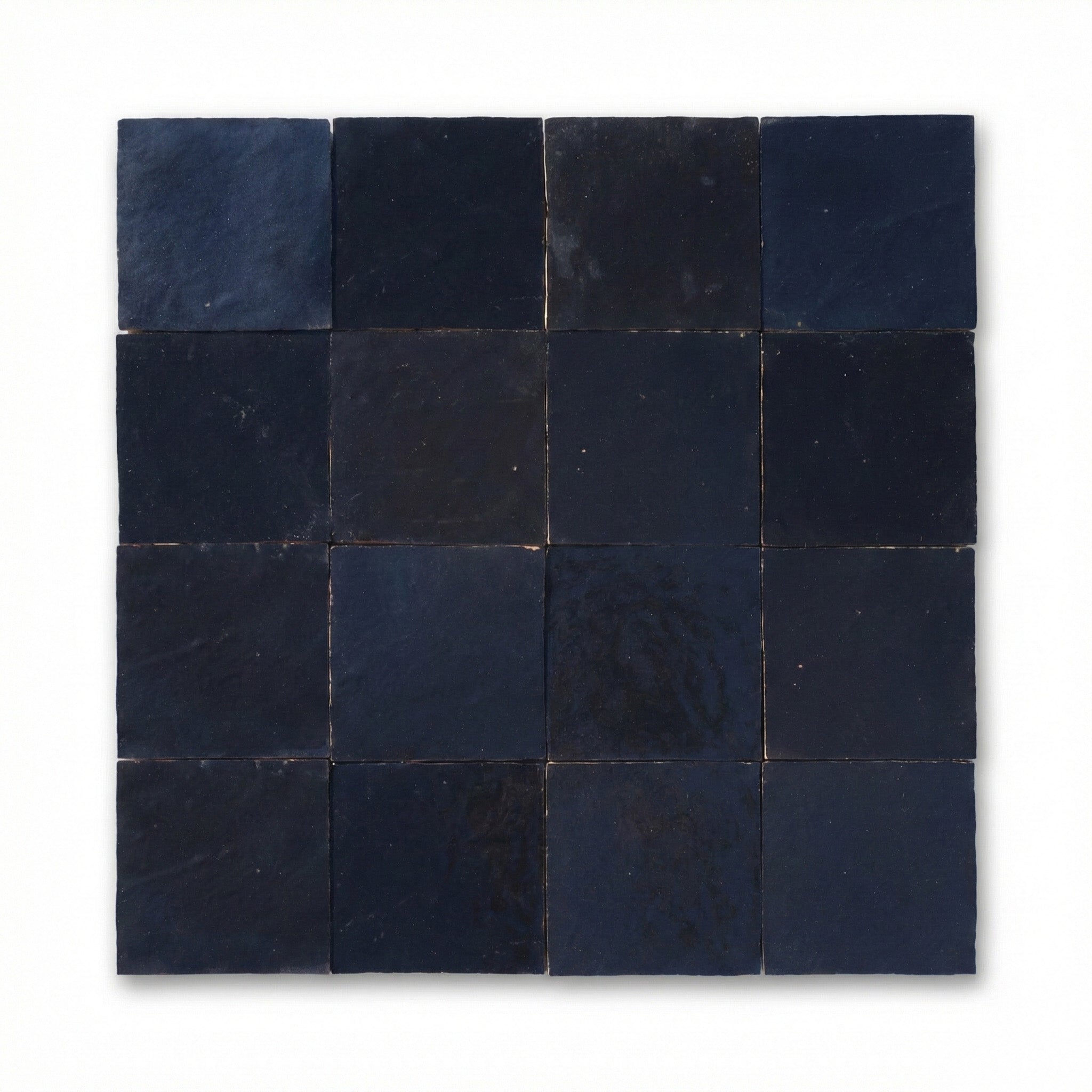 Checkerboard pattern of dark tiles on a white background