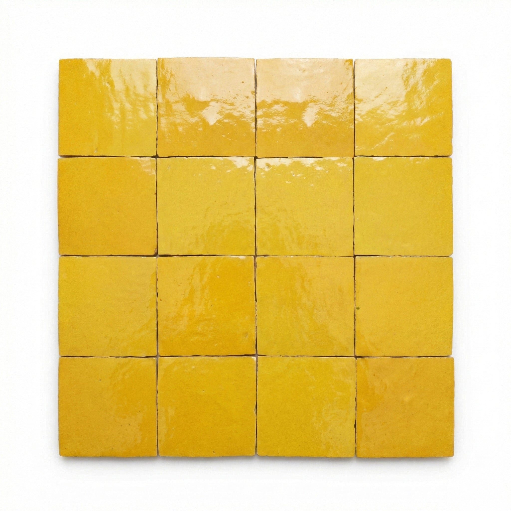 Dakhla Yellow Zellige tiles, 10x10cm handcrafted Moroccan golden yellow terracotta wall tiles with a glossy, textured finish.